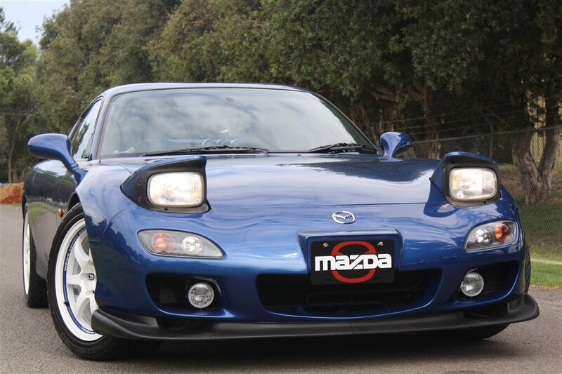 Blue Mazda RX-7 sports car