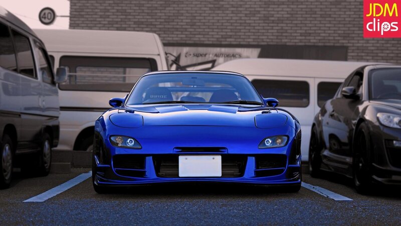 blue mazda rx-7 sports car