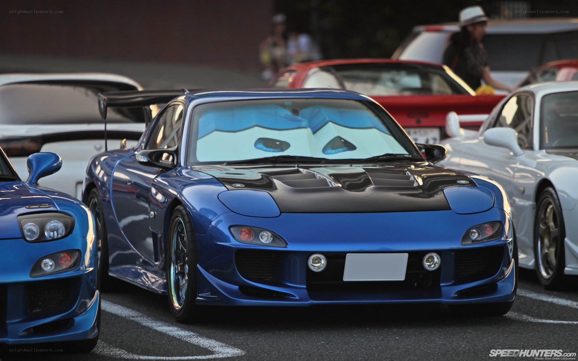 Blue Mazda RX-7 with sunshade