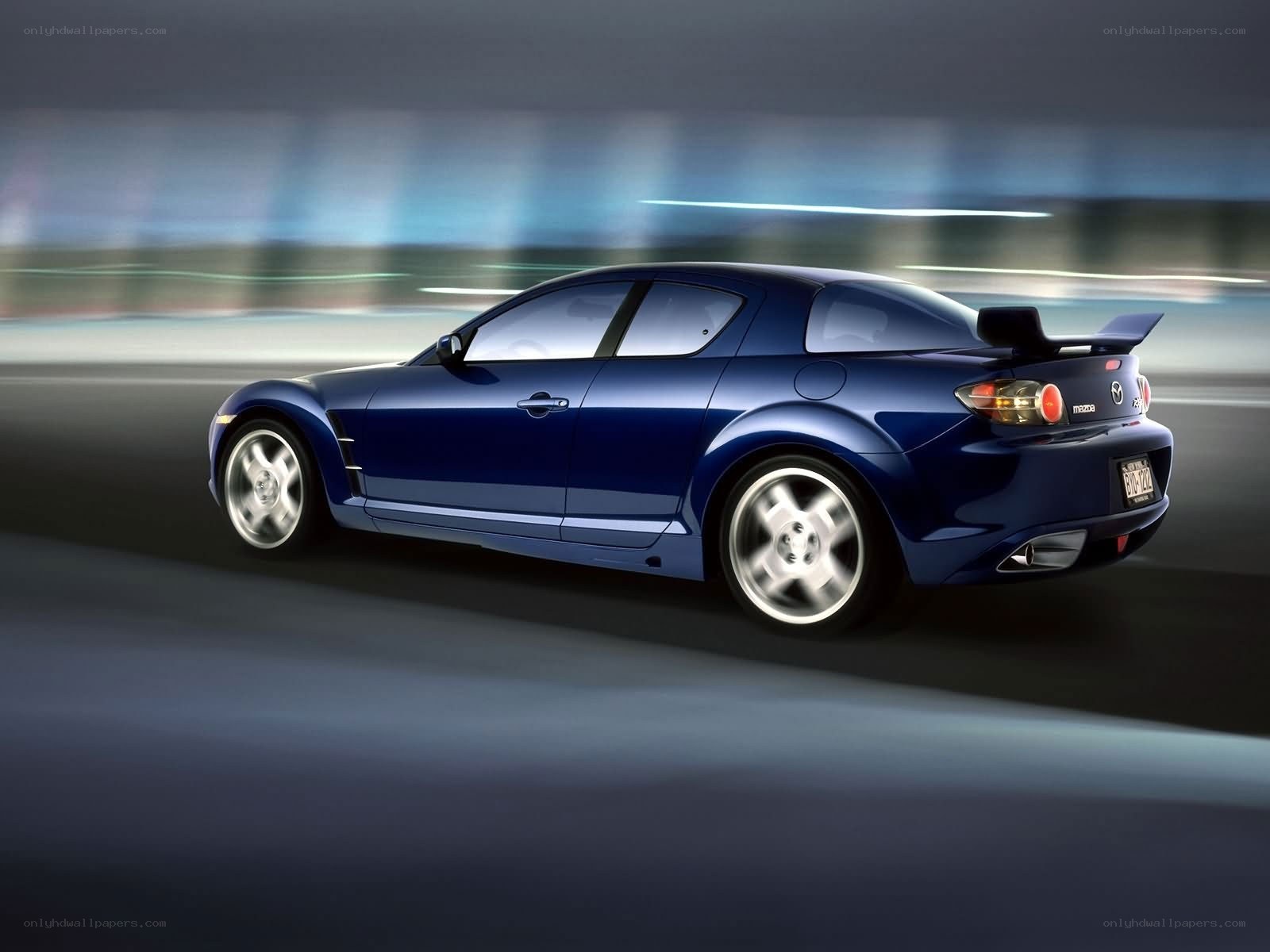Blue Mazda RX-8 in motion