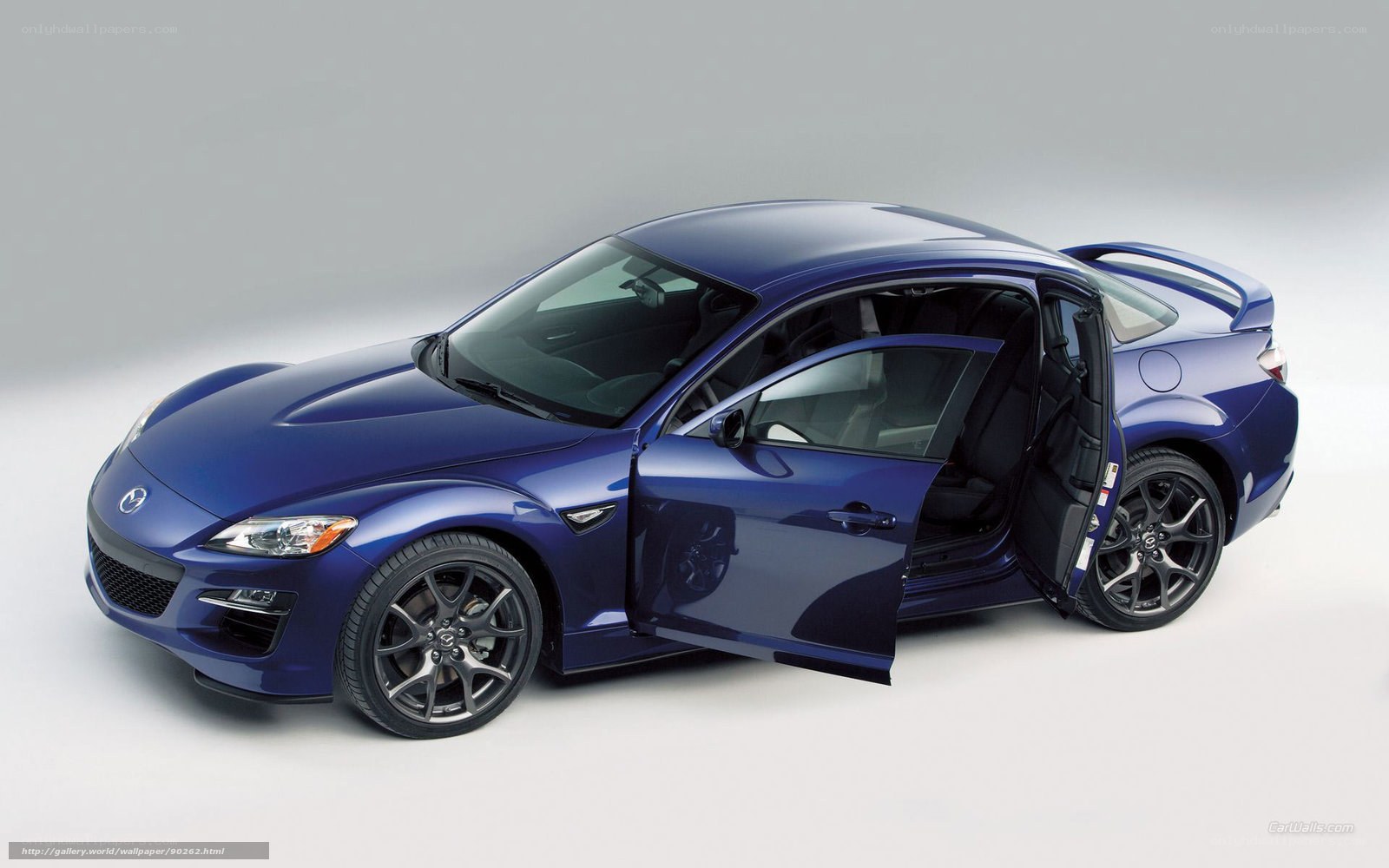blue mazda rx-8 sports car