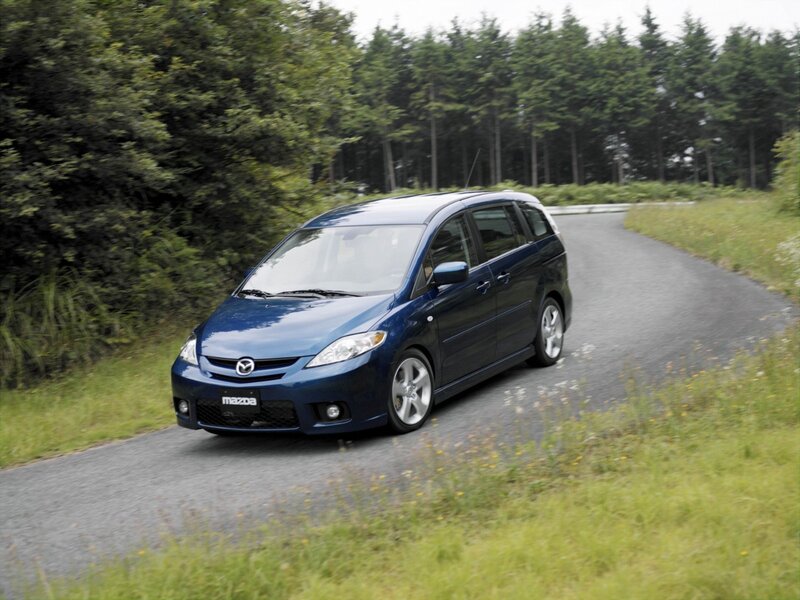 Blue Mazda5 on a country road