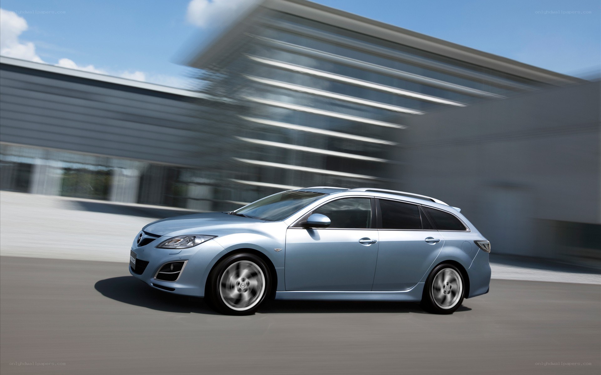 Blue Mazda6 Wagon in Motion