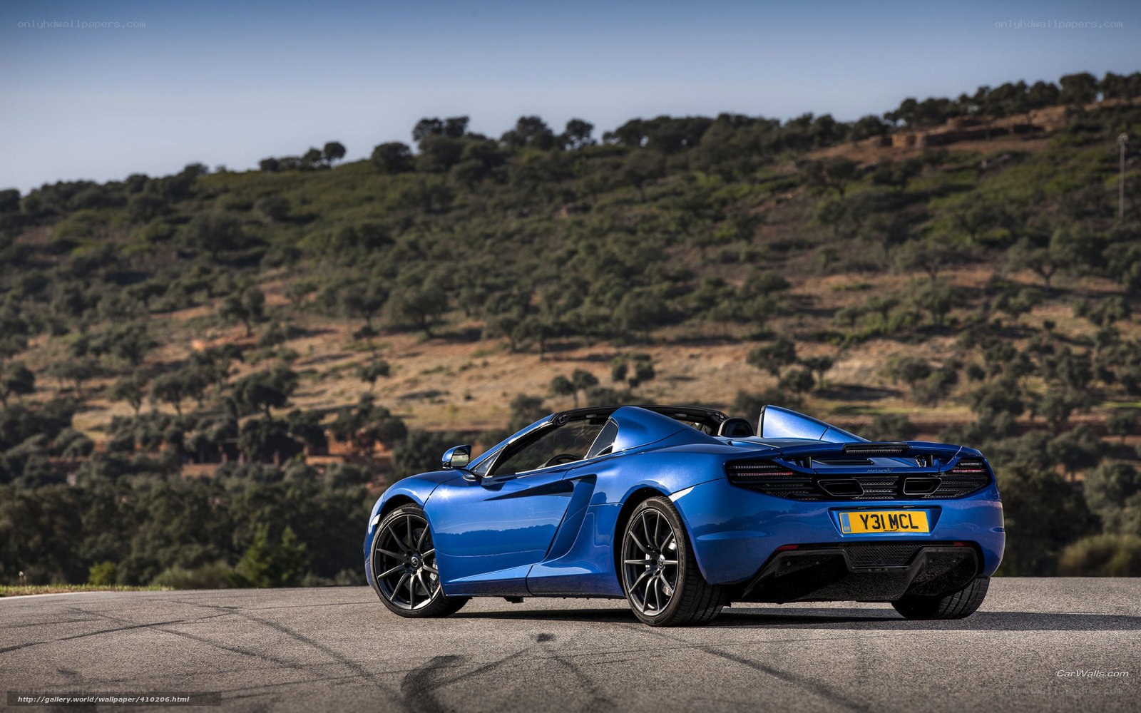 blue mclaren convertible sports car