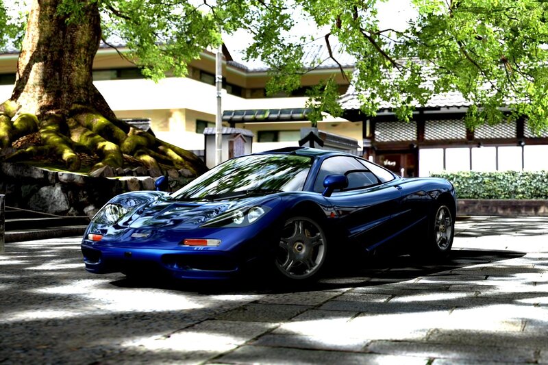 Blue McLaren F1 in a Japanese garden
