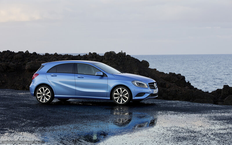 Blue Mercedes-Benz A-Class by the sea