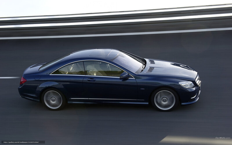 blue mercedes-benz coupe in motion