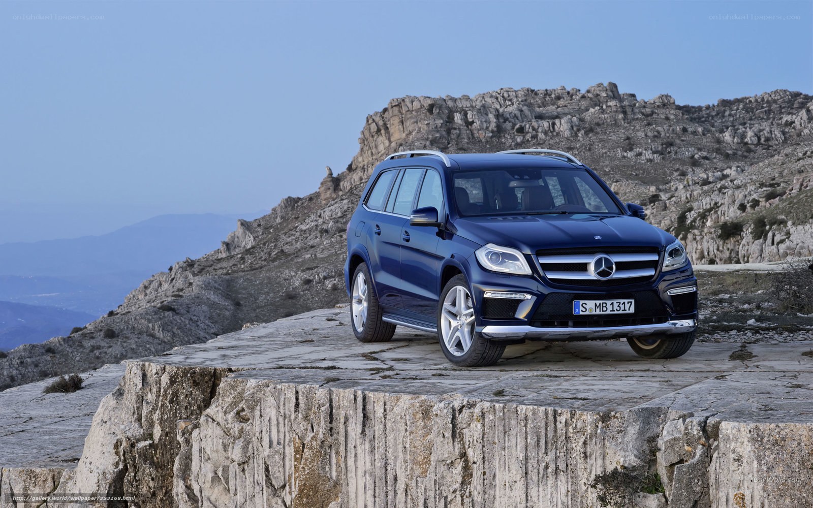 Blue Mercedes-Benz GL-Class on cliff