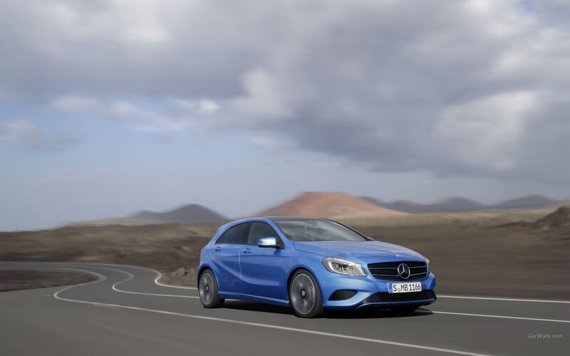 blue mercedes-benz on winding road