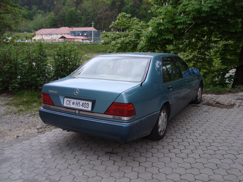 Blue Mercedes-Benz parked outdoors