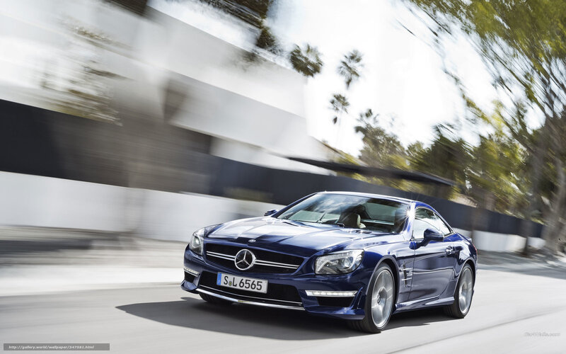 blue mercedes-benz sl63 amg in motion