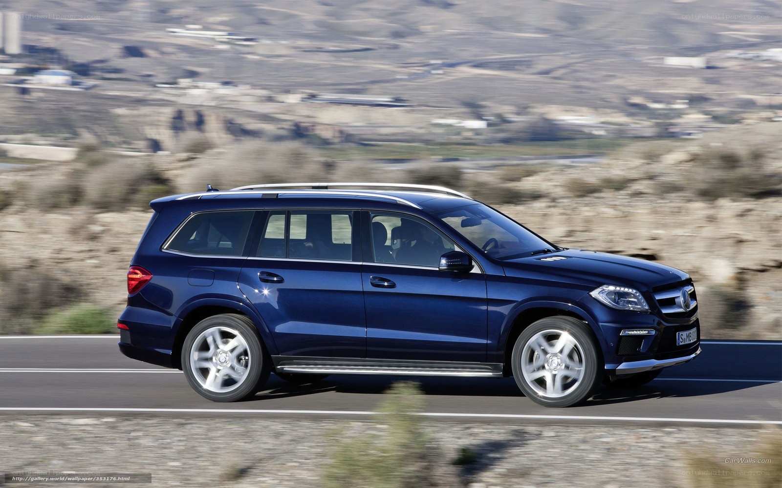 blue mercedes-benz suv on road