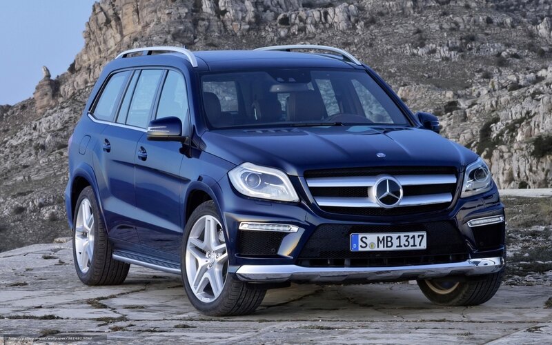 Blue Mercedes-Benz SUV on rocky terrain