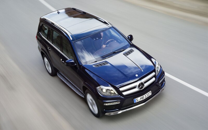 blue mercedes suv driving