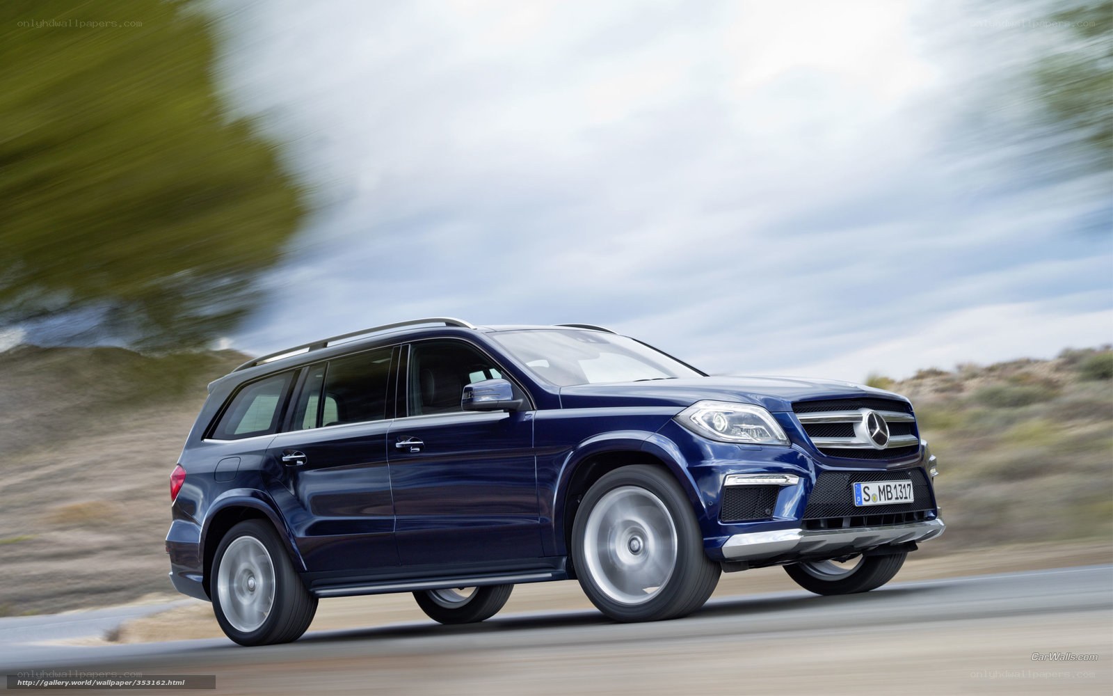 blue mercedes suv in motion