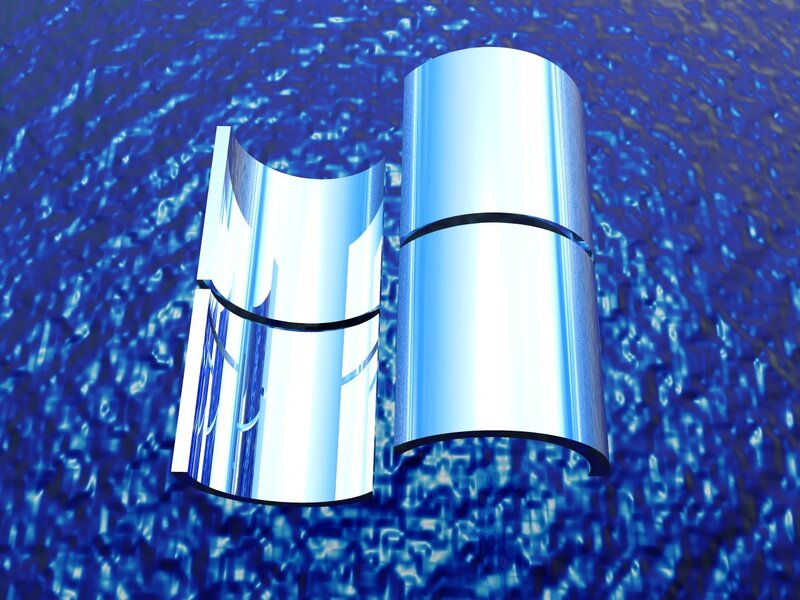 blue metallic cylinders on textured surface