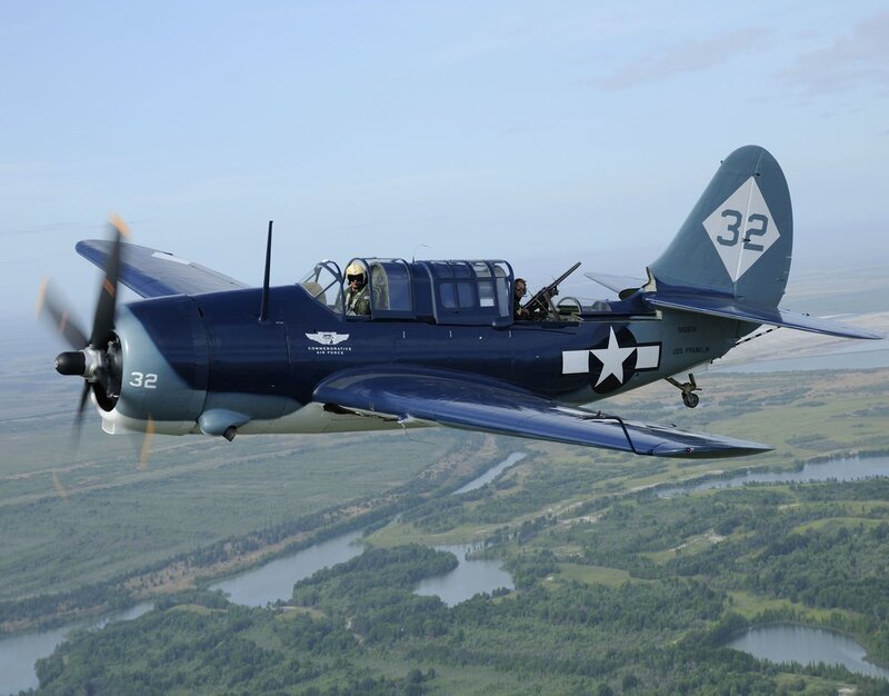 Blue Military Aircraft — Serene, Afternoon