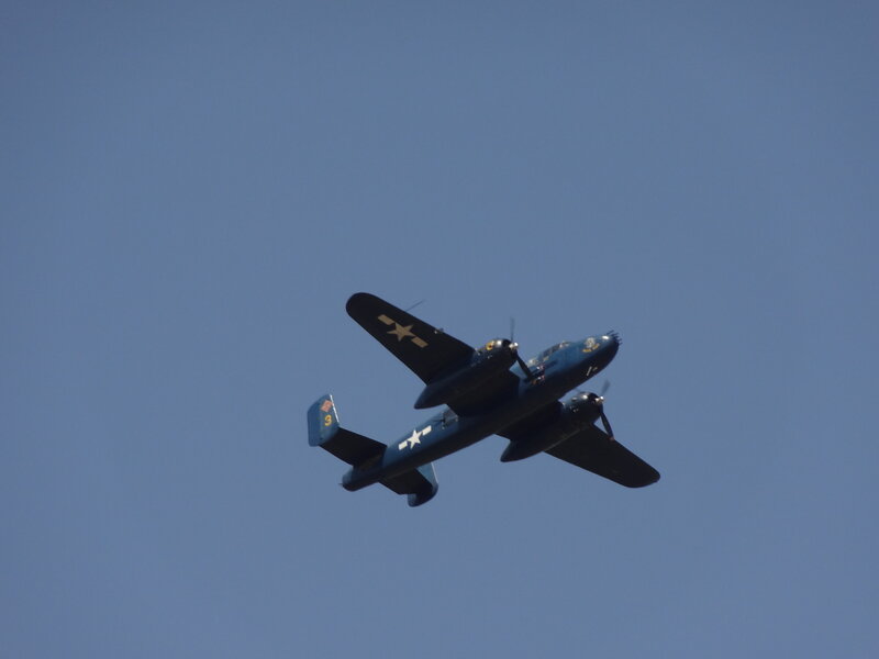 Blue Military Airplane — Clear, Afternoon