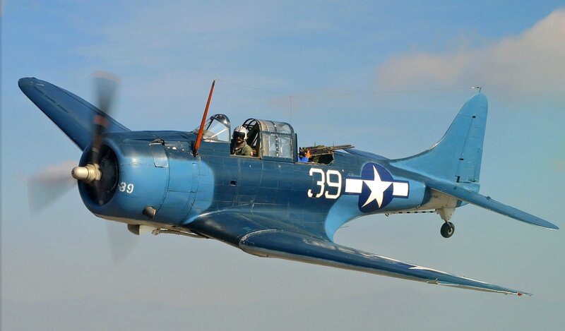 Blue Military Airplane — Dynamic, Afternoon, Photograph, Pilot