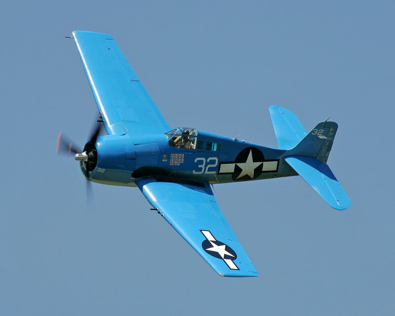 Blue Military Airplane — Dynamic, Afternoon, Photograph