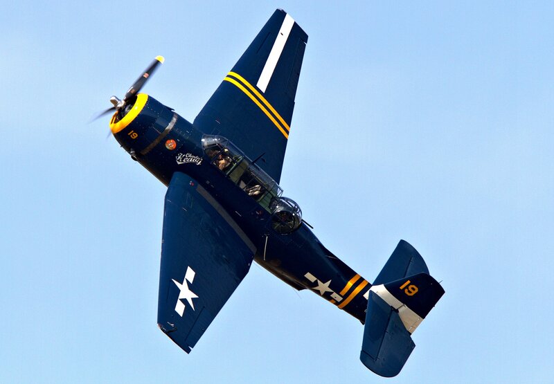 Blue Military Plane — Dynamic, Afternoon, Photograph, Propeller