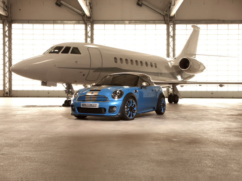 Blue Mini Concept car in hangar