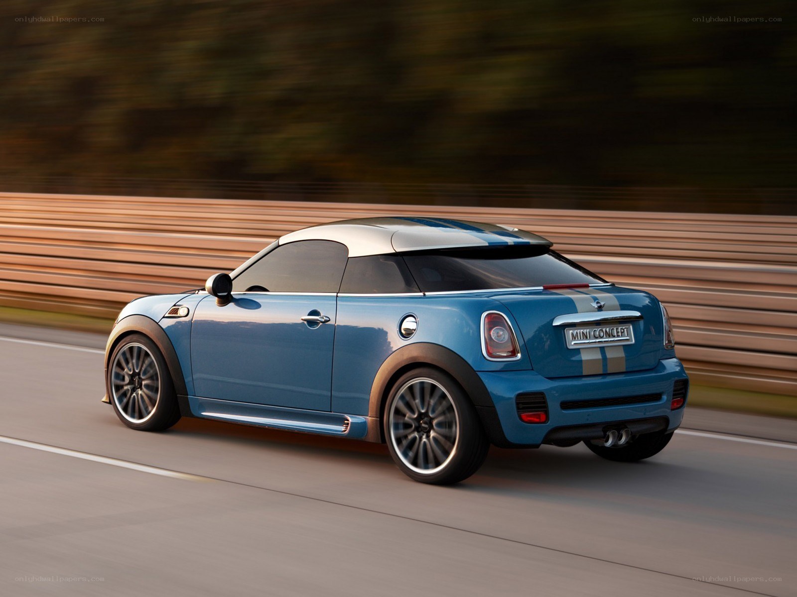 Blue MINI Concept car in motion