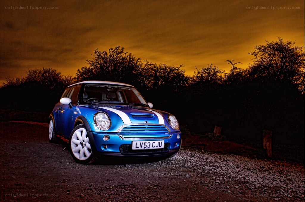 Blue Mini Cooper at dusk
