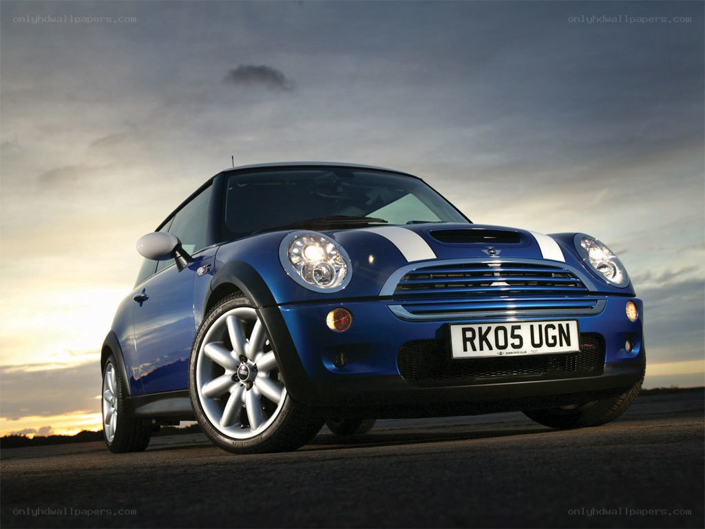 blue mini cooper at sunset