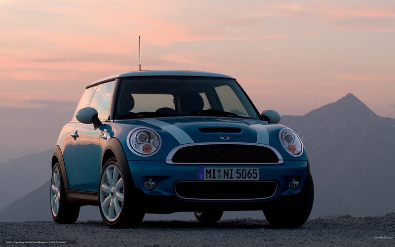 Blue Mini Cooper at sunset