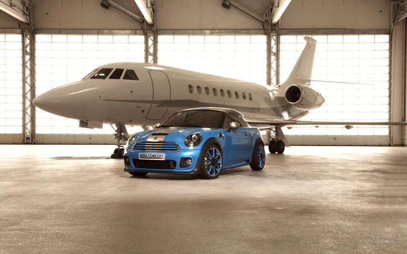 Blue Mini Cooper Car — Dramatic, Photograph, Airplane