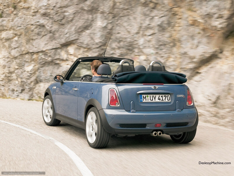 blue mini cooper convertible driving