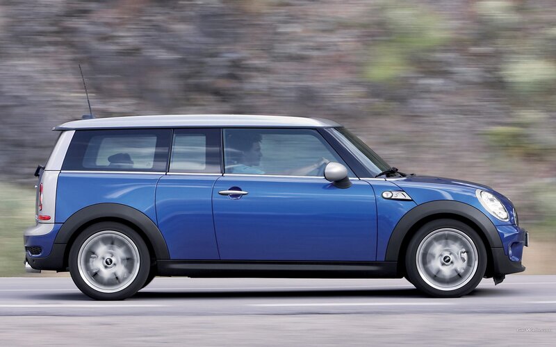 blue mini cooper in motion