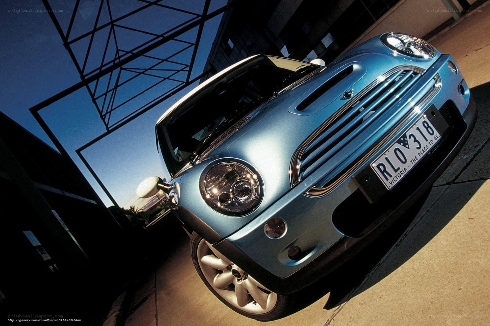 Blue Mini Cooper in urban setting