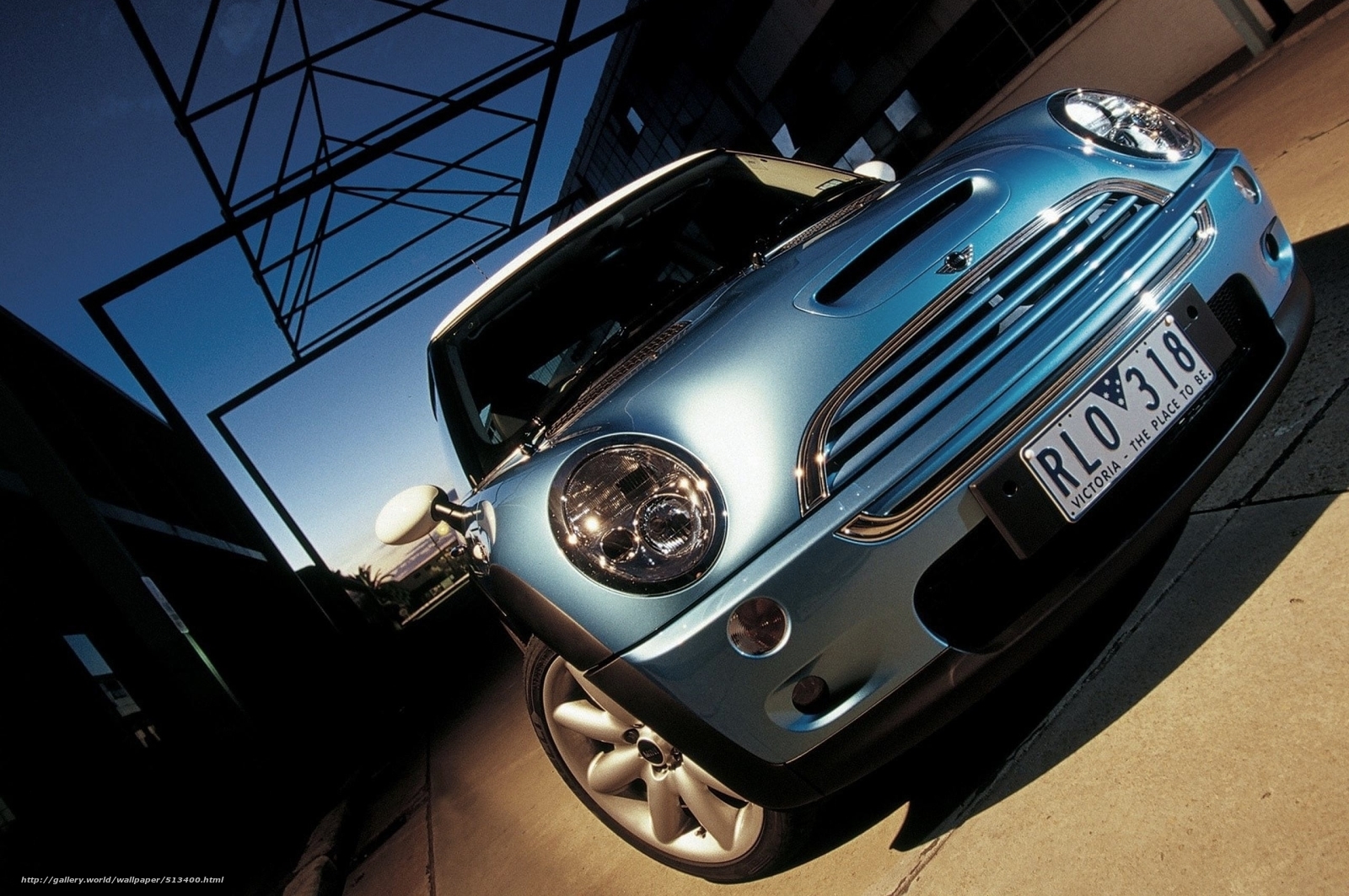 Blue Mini Cooper in urban setting