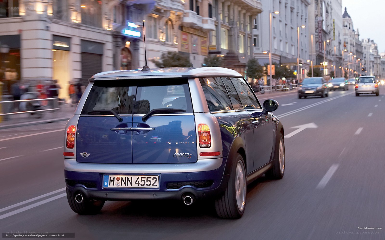Blue Mini Cooper on city street