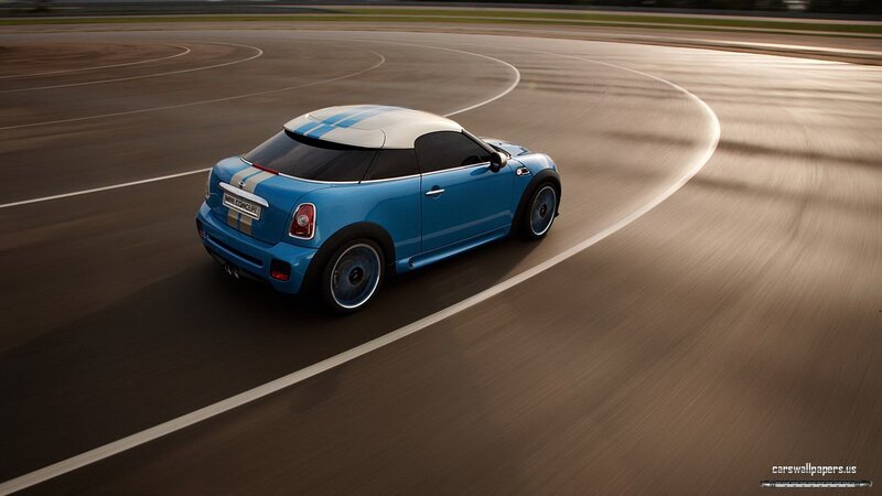 blue mini cooper on racetrack