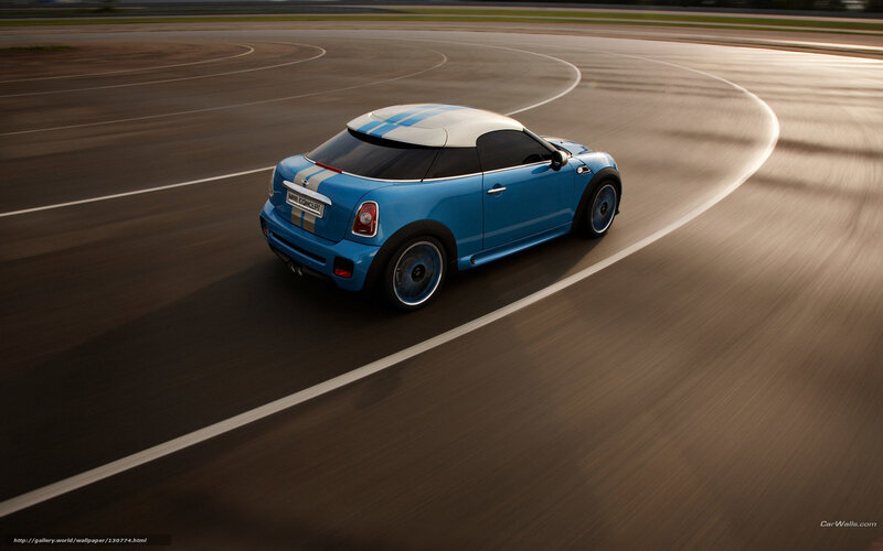 Blue Mini Cooper on racetrack