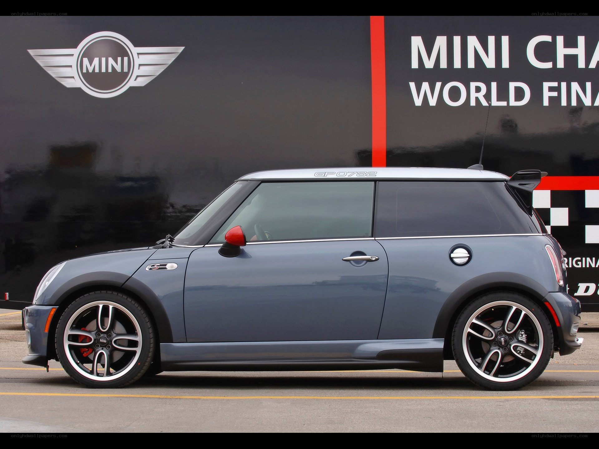 Blue MINI Cooper parked at event