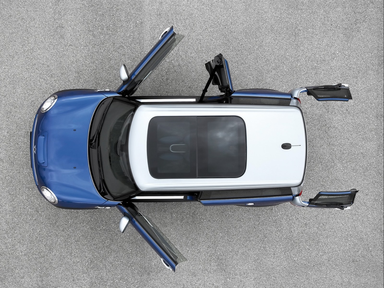 Blue Mini Cooper with open doors