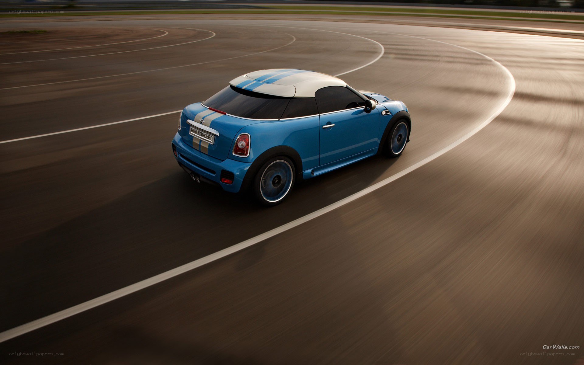 blue mini on racetrack