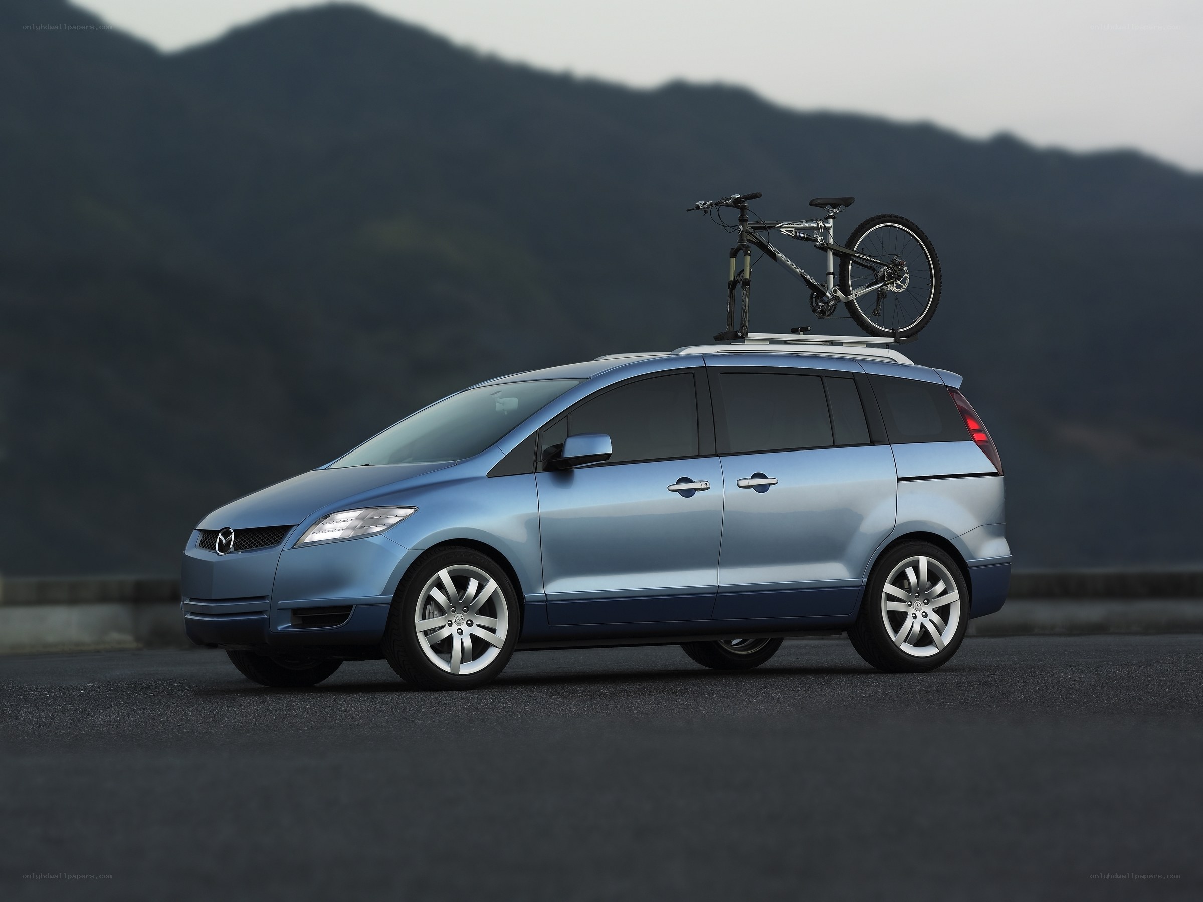 Blue minivan with bike rack