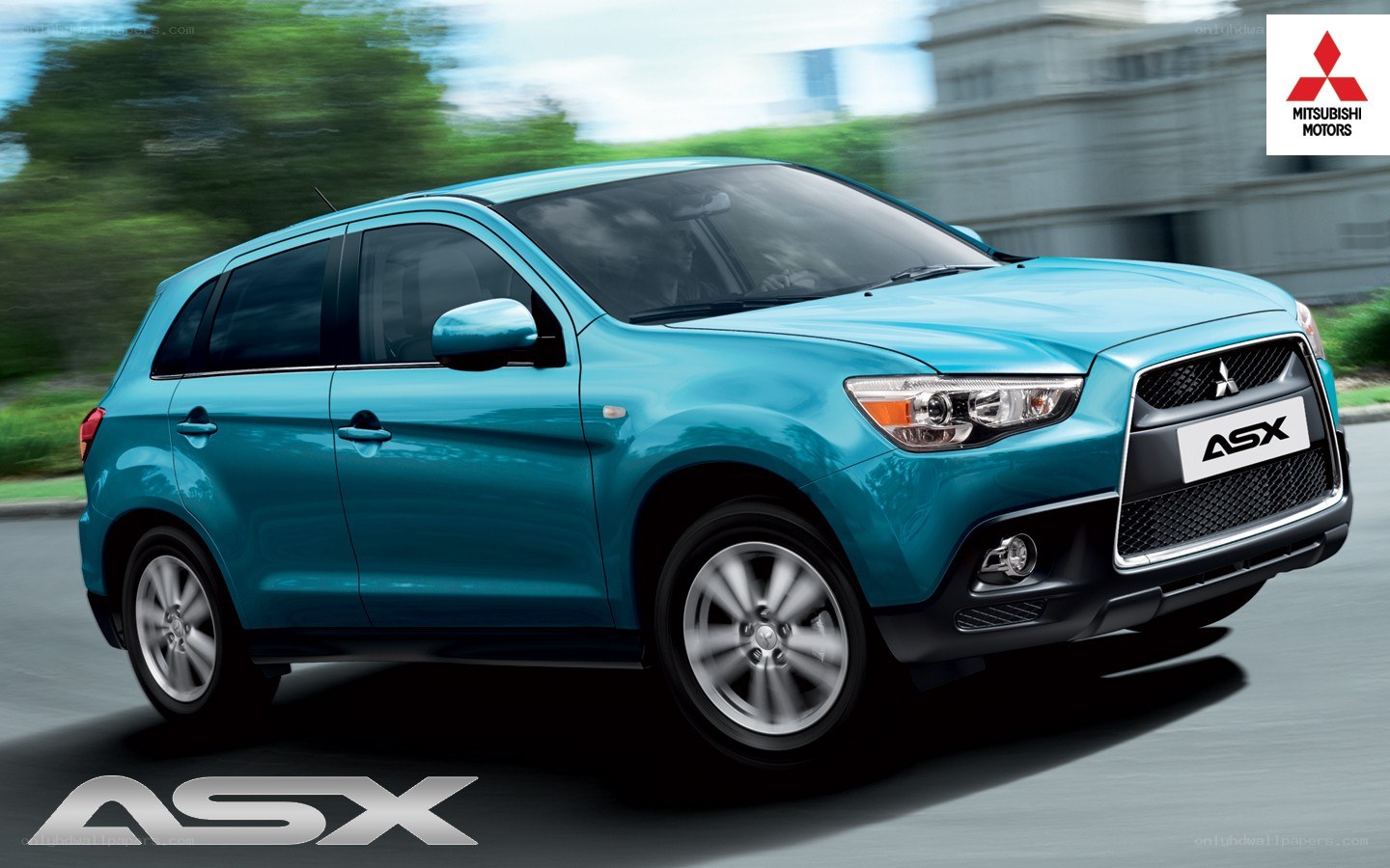 Blue Mitsubishi ASX in motion
