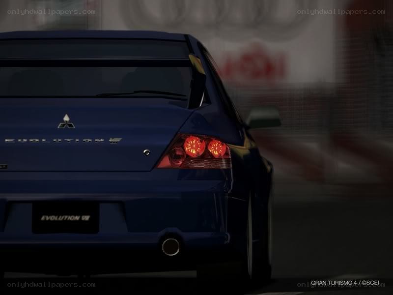 blue mitsubishi evolution rear view