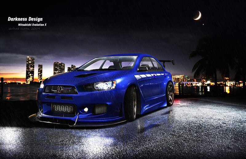 Blue Mitsubishi Evolution X at night