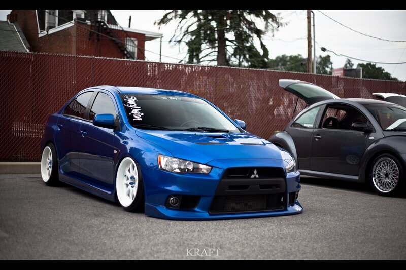 Blue Mitsubishi Lancer — Calm, Afternoon, Photograph, Car