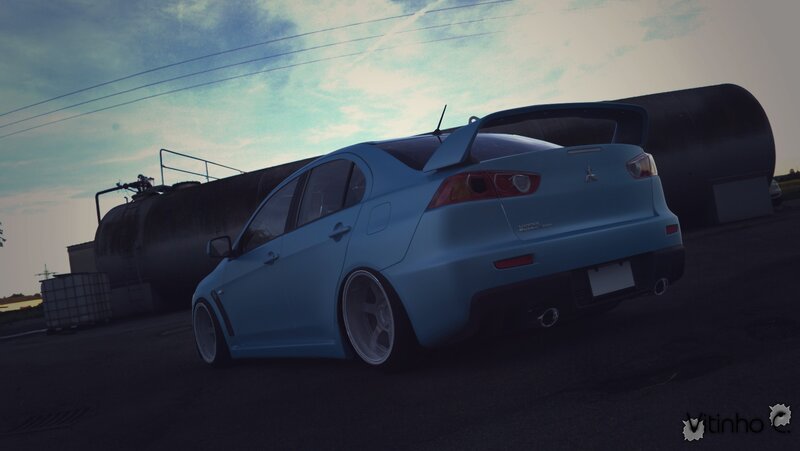 Blue Mitsubishi Lancer — Dramatic, Sunset, Photograph, Tanker Truck