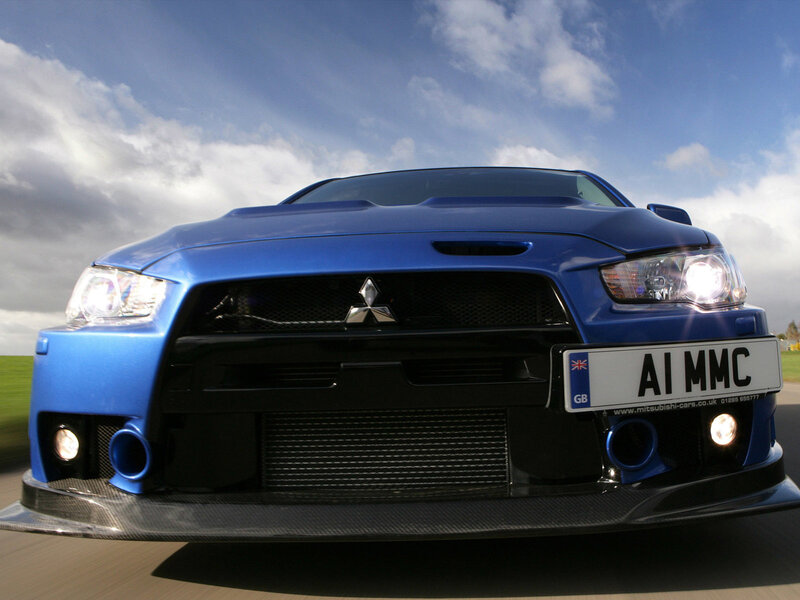Blue Mitsubishi Lancer — Dynamic, Afternoon, Photograph, Car, License Plate