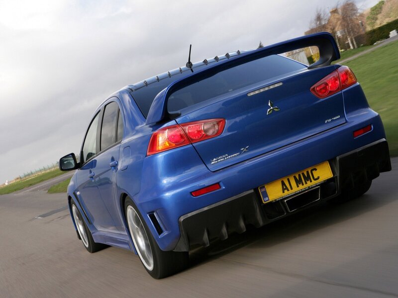 Blue Mitsubishi Lancer — Dynamic, Photograph