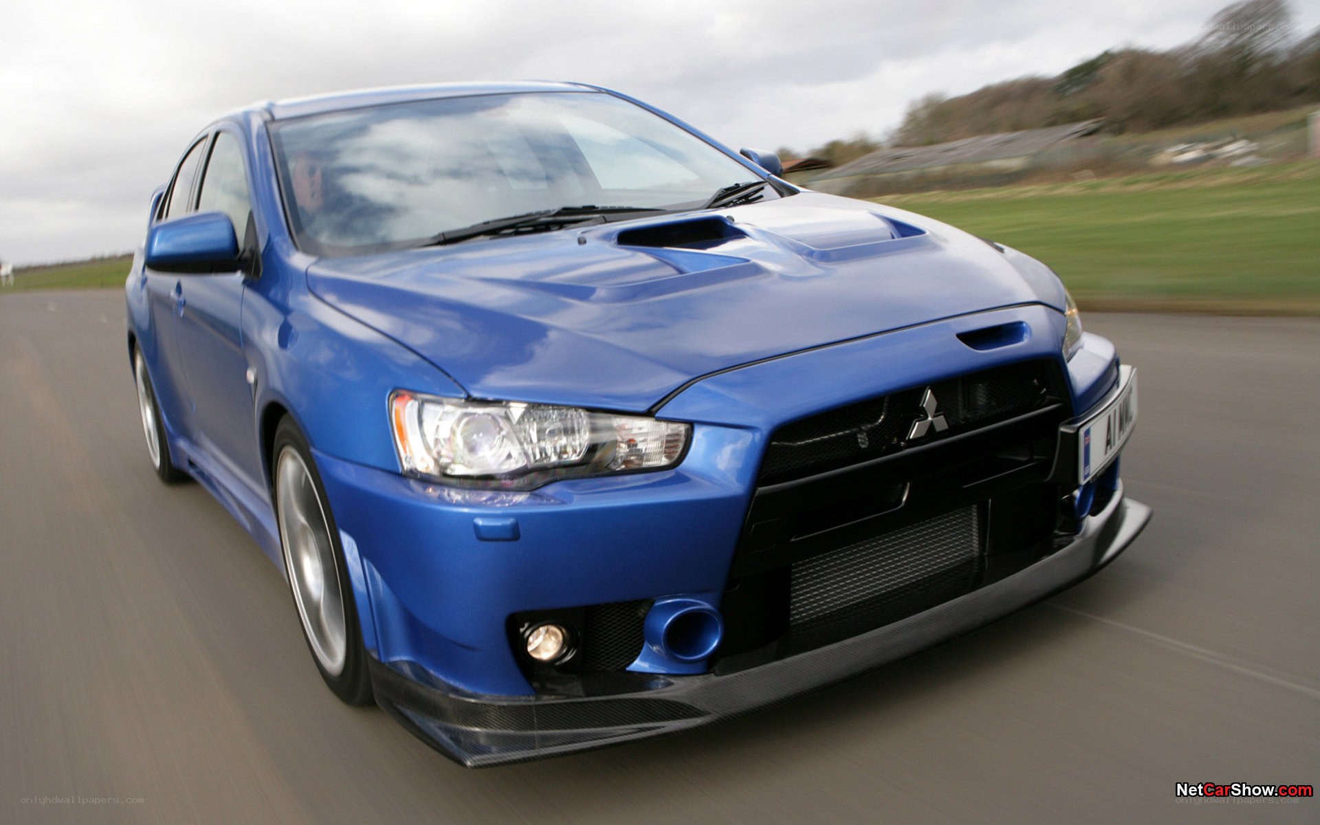 blue mitsubishi lancer evolution